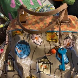 It’s a beautiful bag with birdcages very unique